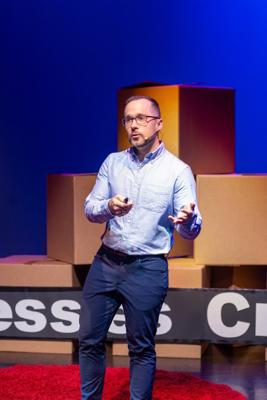 Brenen Blair speaking on the TEDx stage